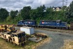 SRY 110/108 switching propane tank cars in the Wellcox Yard, using some old rolling stock as buffers.